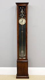 Princeps Master Clock: An early 20th century Princeps Electric Floor Model Master clock. Papered metal dial with Roman numerals marked "Princeps, New System, 1 Arundel St, W. C. 2, Electrical, Made In England" surmounted by