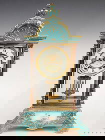 Ansonia Crystal Regulator No 4: A turn of the century Ansonia crystal regulator No. 4. 8-day time and strike movement with visible escapement and two part porcelain dial with Roman numerals and faux mercury pendulum. Molded porcelai