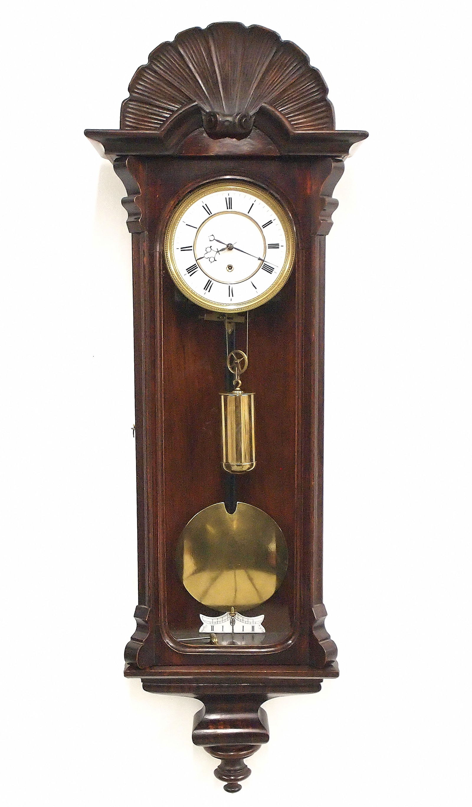 Dwarf Vienna Regulator Wall Clock: A 19th century one weight Dwarf Vienna Regulator wall clock. 8-day time only movement with 5 1/4" two part porcelain dial and Roman numerals with a molded brass bezel. Mahogany case with shaped crest