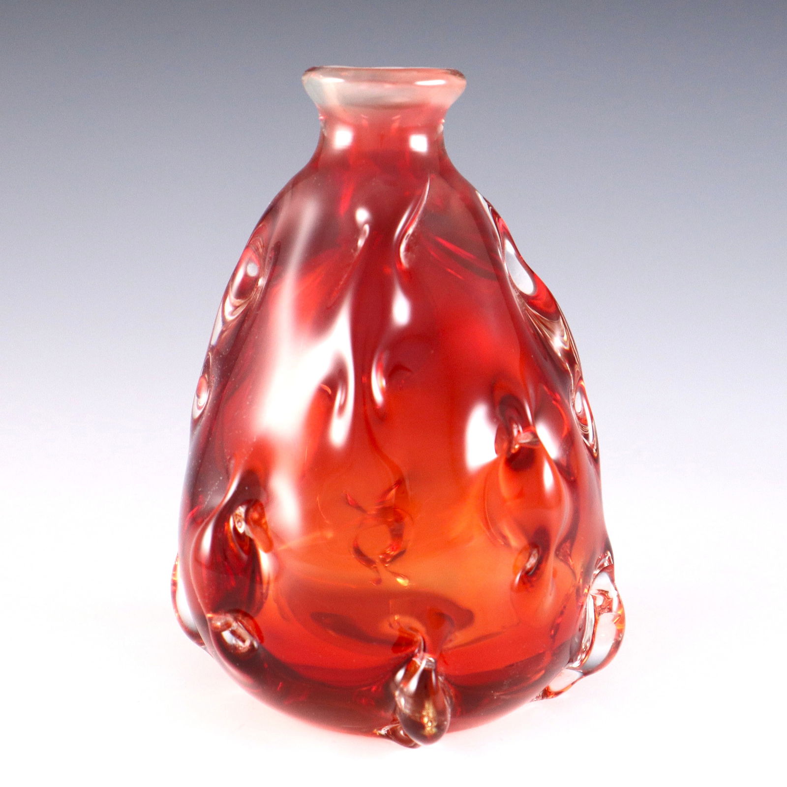 Labino Art Glass Vase: Dominick Labino, American (Toledo), 1910-1987. A 1980's vase with pinched molten glass body in shades of Red and Orange. Signed "Labino" and dated "6-1981" at underside. Minor surface wear. 5 1/4" hig