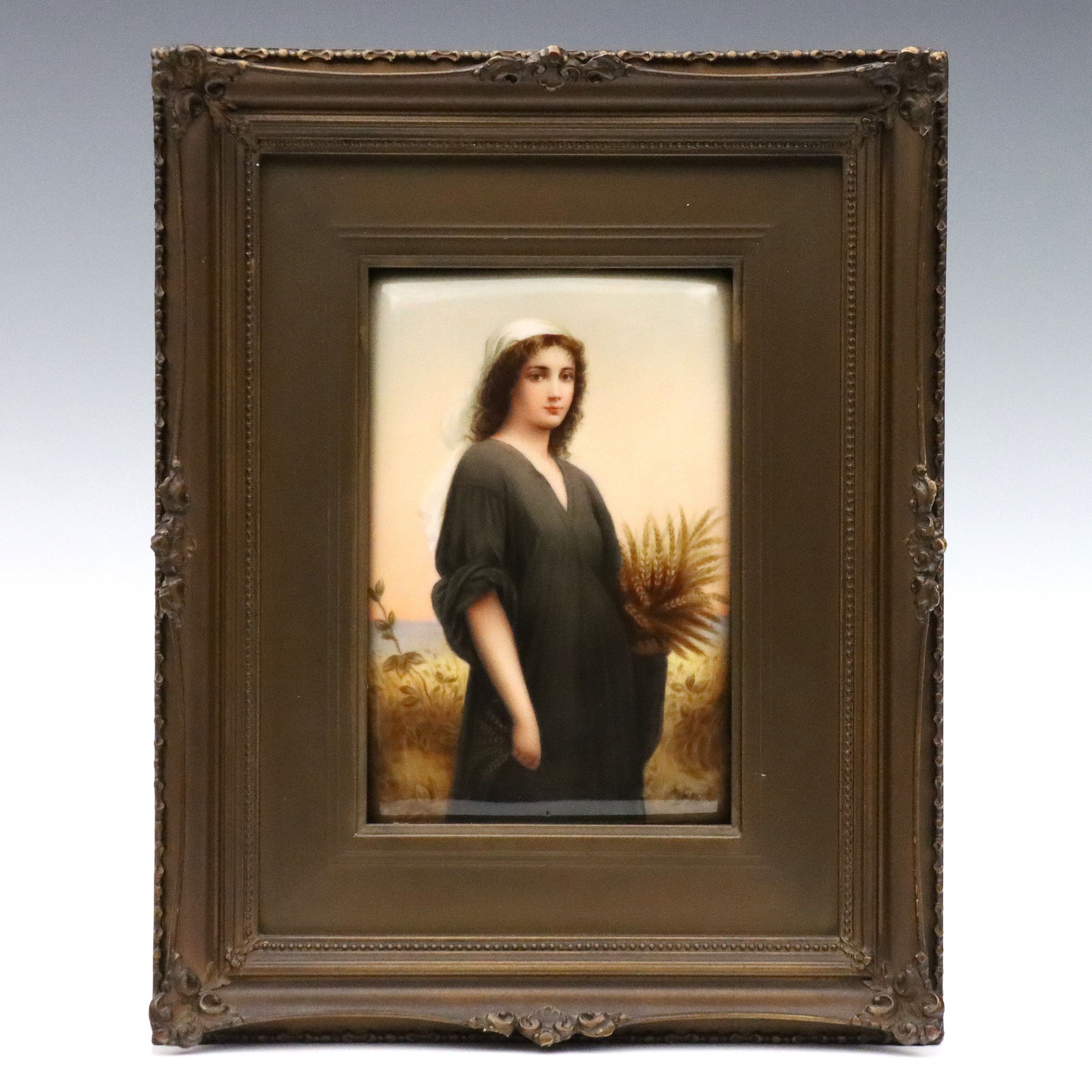 KPM Porcelain Plaque after Landelle: A turn of the century KPM porcelain plaque after Charles Zacharie Landelle. Hand-painted depiction of Ruth standing with a sheaf of wheat. Signed "Wagner" by artist F. Wagner Wien lower right, impress