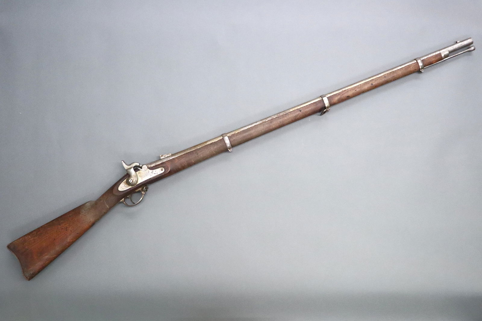 Colt's M1862 Long Rifle: A 19th century U.S. Civil War Era Colt's Model 1862 long rifle. .60 Caliber black powder rifle with 40 1/4" barrel and Walnut stock. Marked "U.S. / Colt's PTF. A. MFG. Co. / Hartford, CT" at lock plat