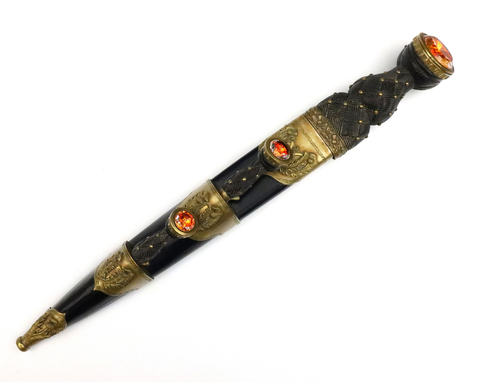 Scottish Kirkwood Regimental Dirk: A late 19th century Scottish Regimental dirk by Robert & Henry Bruce Kirkwood, Edinburgh. Hardwood hilt with carved basketweave design and brass nails, having a faceted glass pommel with Orange foil b