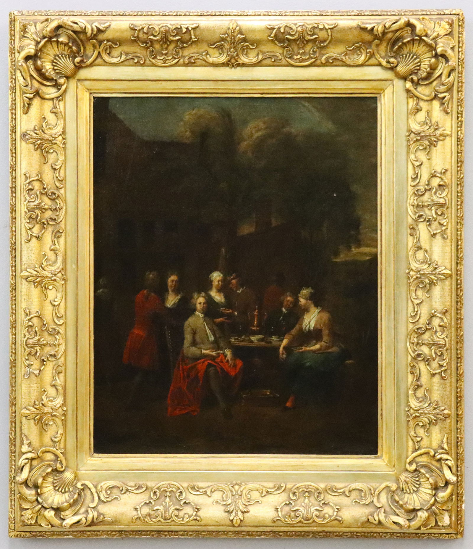 Jan Baptist Lambrechts Genre Scene: Attributed to Jan Baptist Lambrechts, Flemish, 1680-c. 1731. An early 18th century oil on canvas genre scene depicting a gregarious group of men and women gathered around a table drinking tea. Image i