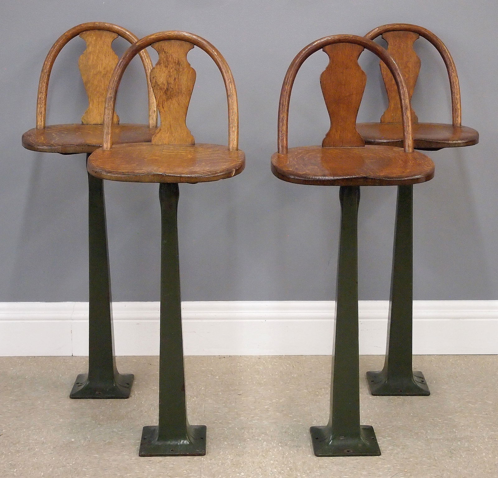 4 Vintage Soda Fountain Stools: Four early 20th century Soda Fountian stools by the Milwaukee Chair Company for the Northwestern Furniture Company, Milwaukee, WI. Cast Iron floor mount bases with Green porcelain finish with