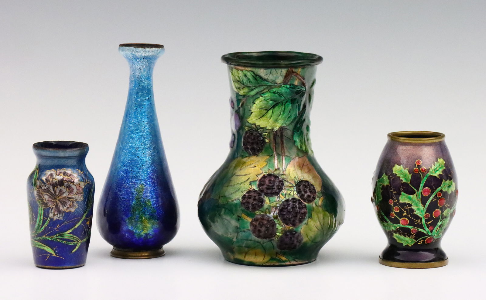 4 French Miniature Enameled Copper Vases: Four 19th century French miniature enameled Copper vases. Baluster forms with hand-enameled scenic decoration depicting fruit and florals. Slender Blue vase signed by the artist "C. Faure / Limoges".