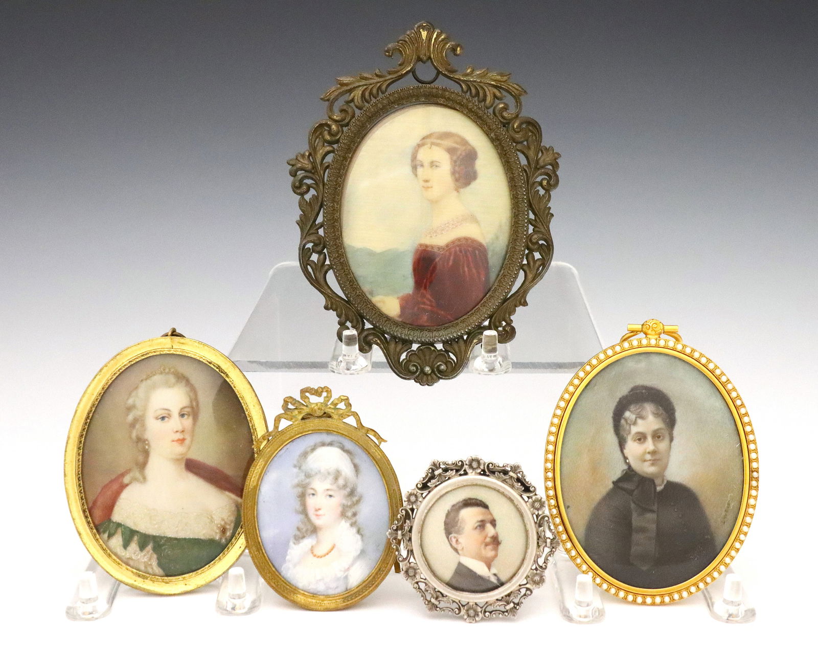5 Miniature Portraits: Five 19th century miniature painted portraits. Includes one of Cornelia Vetterlein wearing a Red gown after Joseph Karl Stieler, one of a woman wearing a Green gown and tiara, one of a woman in a Blac