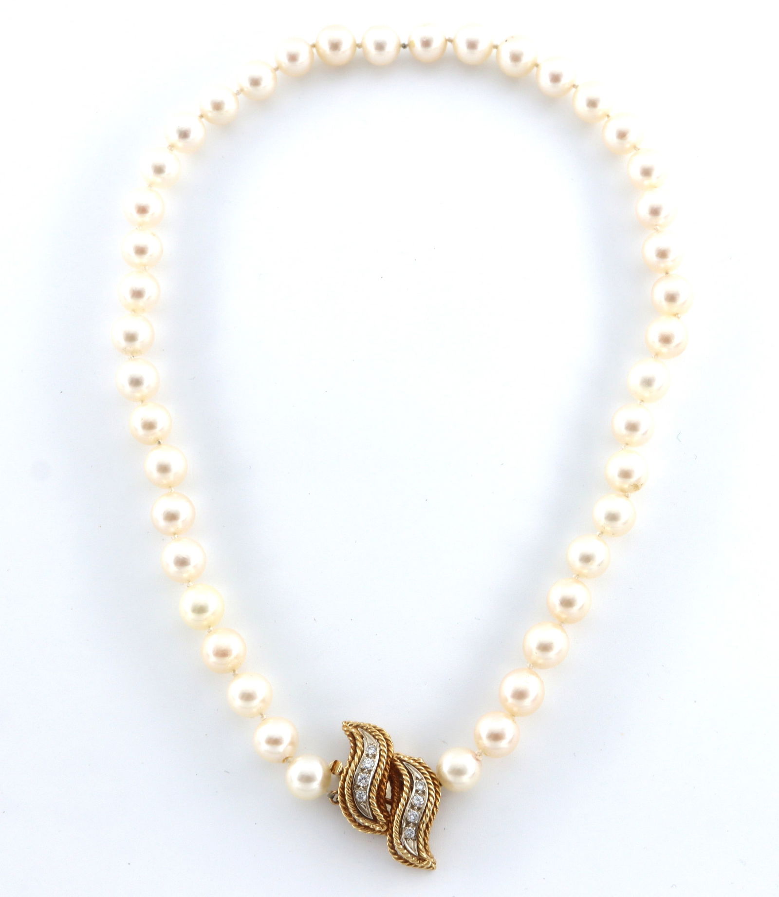 18k Gold & Pearl Necklace: A Pearl choker necklace with 18k Gold clasp and Diamonds. Features a single strand of forty-two cultured round Pearls, averaging 8 to 8.5 mm, with an 18k Yellow Gold clasp having a pierced roped