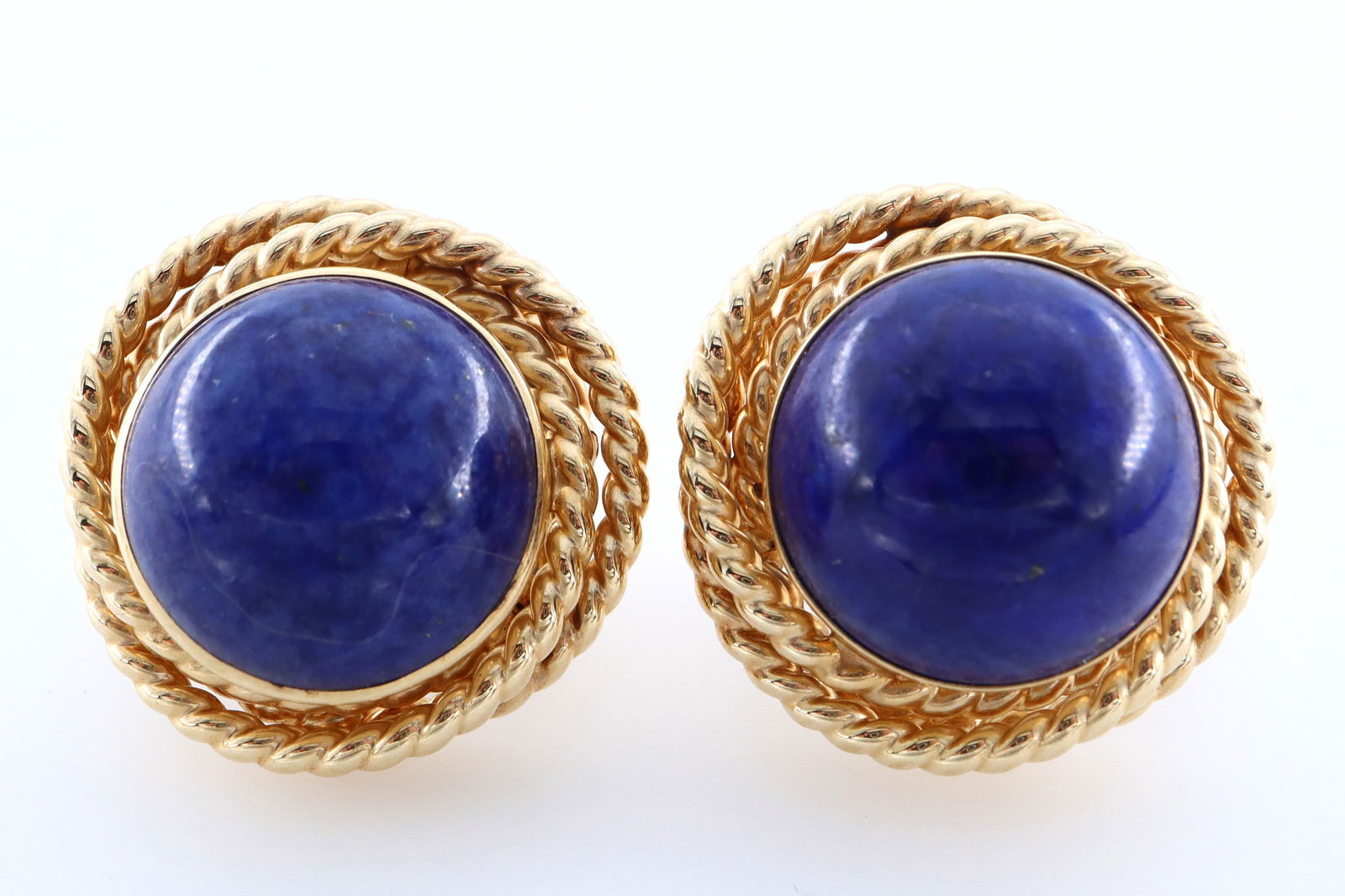 Peter Brams 14k Gold & Lapis Earrings: A pair of Peter Brams Design 14k Gold earrings with Lapis Lazuli. Features a 4.8 mm Lapis Lazuli cabochon surrounded by interlacing twisted Gold wire with pierced lever backs. Marked "14k" and