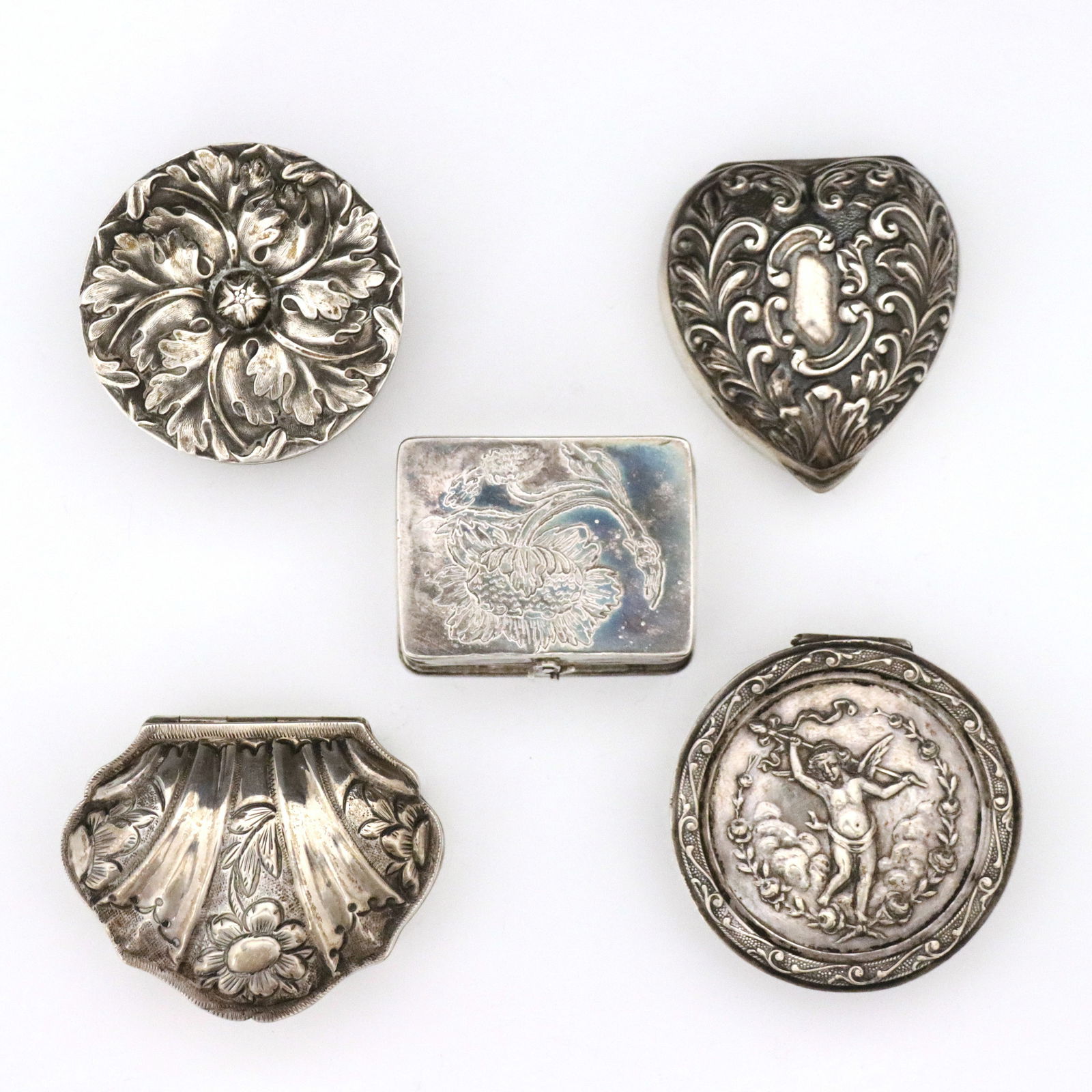 5 Miniature Silver Boxes: Five 19th to early 20th century miniature Silver boxes. Various forms with engraved and repousse decoration, includes four Sterling and one .800 Silver boxes from countries including Germany, England,