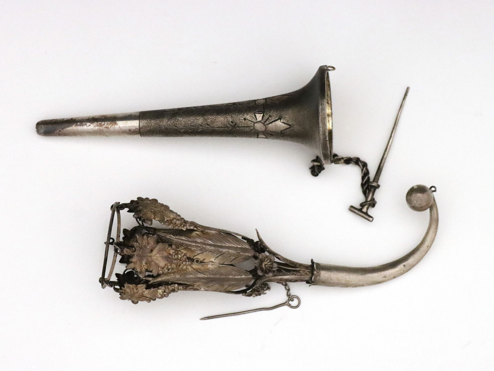 2 Victorian Posy Holders: Two 19th century Victorian Period Sterling and Silverplate posy holders. Includes a Sterling holder with cast grapevine decoration, and a Silverplate holder with engraved decoration. Unmarked,