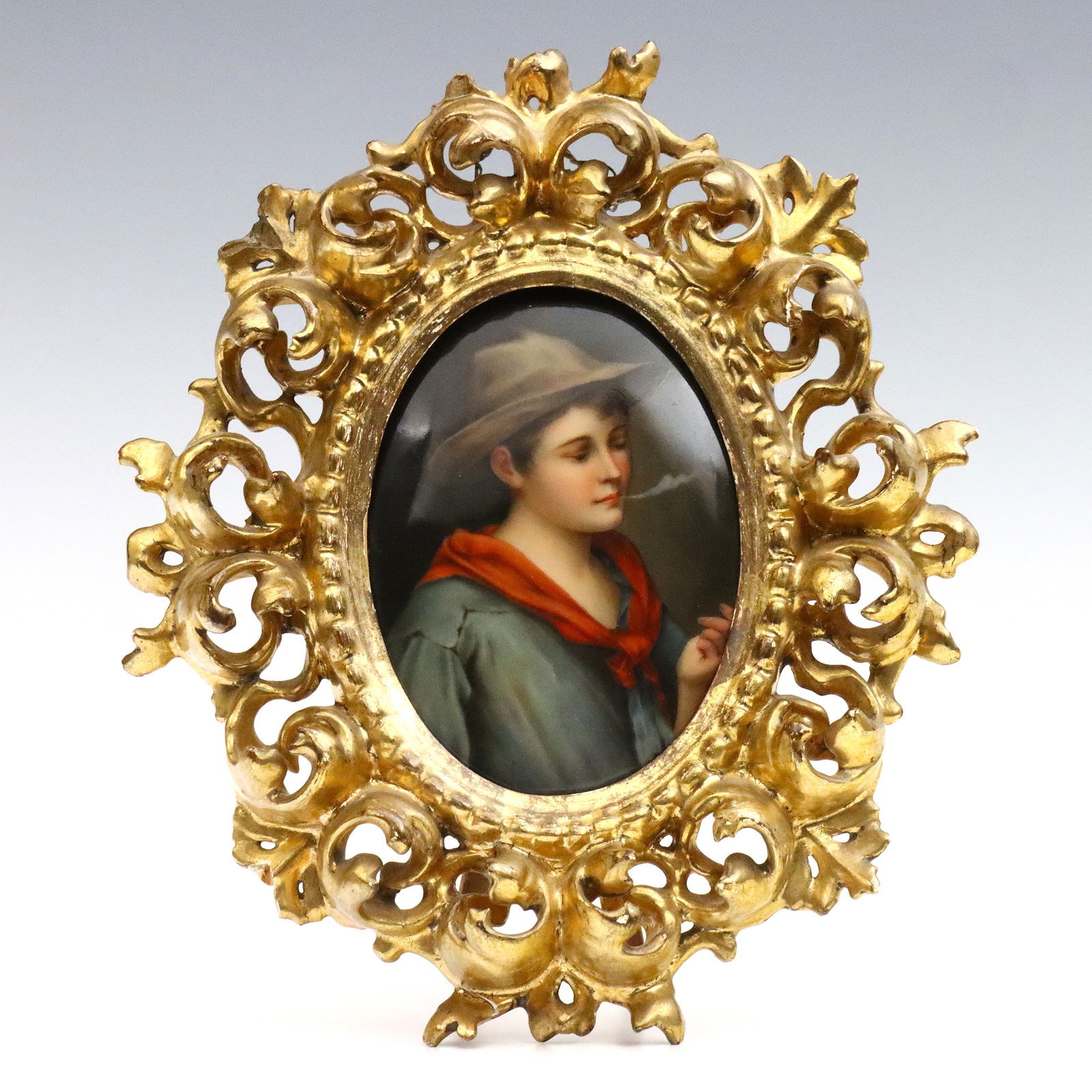 German Porcelain Plaque after von Blaas: A turn of the century German porcelain plaque after Eugene von (de) Blaas (Italian, 1843-1932). Hand-painted depiction of a young boy smoking a cigarette wearing a hat and Red handkerchief. Printed "M