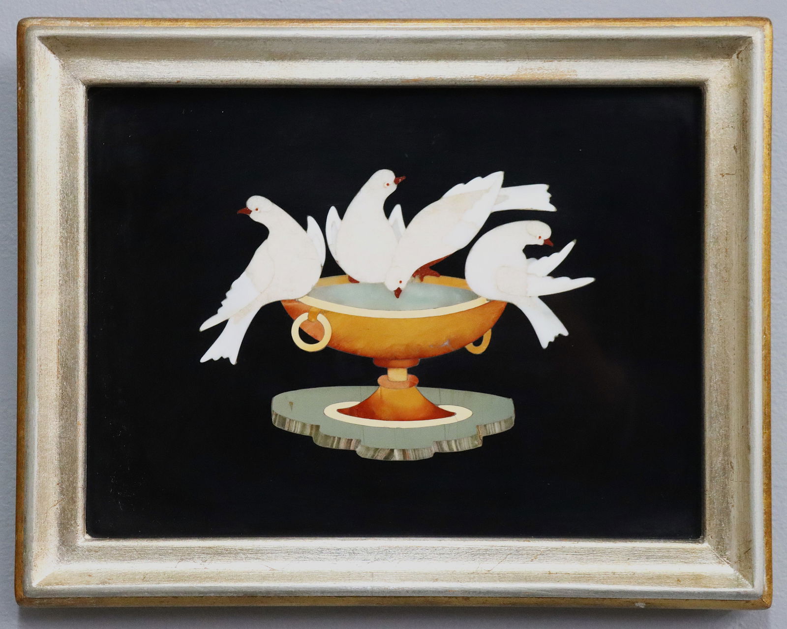 Italian Pietra Dura Plaque: A turn of the century Italian Pietra Dura plaque of the "Capitoline Doves". Inlaid stone image of four doves at birdbath. Also known as "Doves of Pliny" after a Roman floor mosaic discovered at