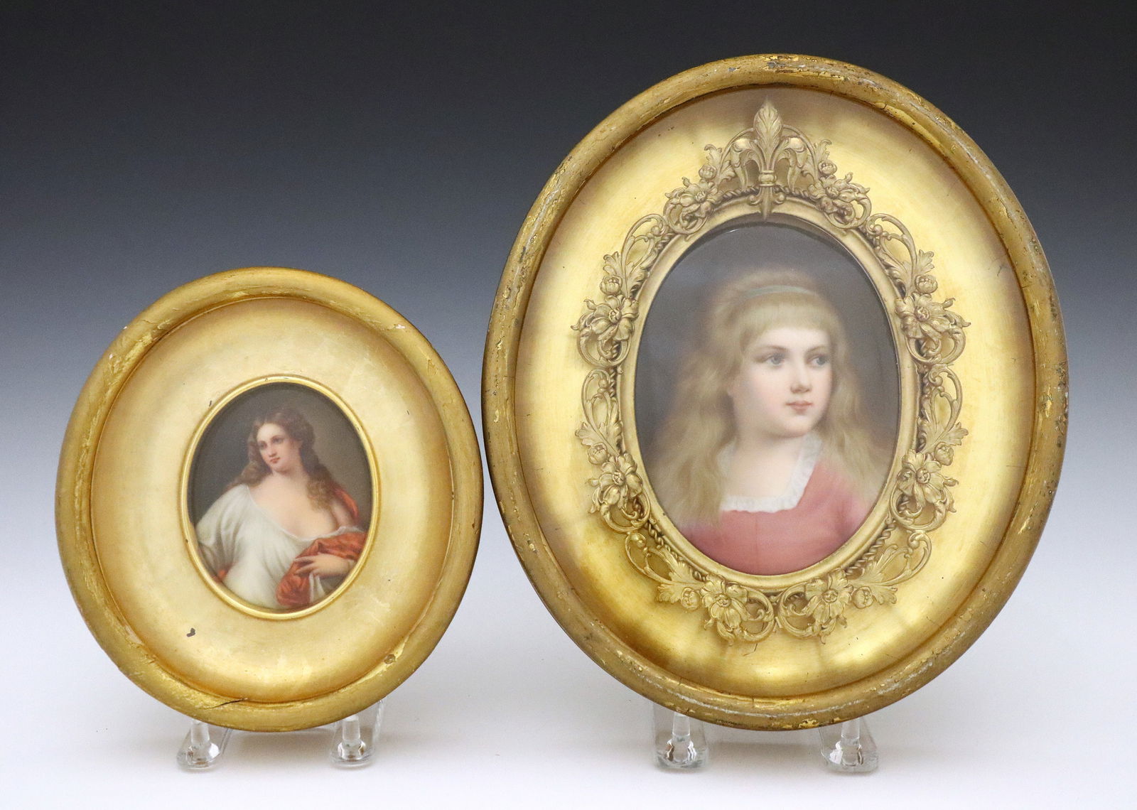 2 Miniature Porcelain Portraits: Two turn of the century Continental miniature porcelain portraits. Includes one of a young girl with blonde hair and a Pink dress, and one of a woman wearing a chemise and Red shawl after "Flora" by T