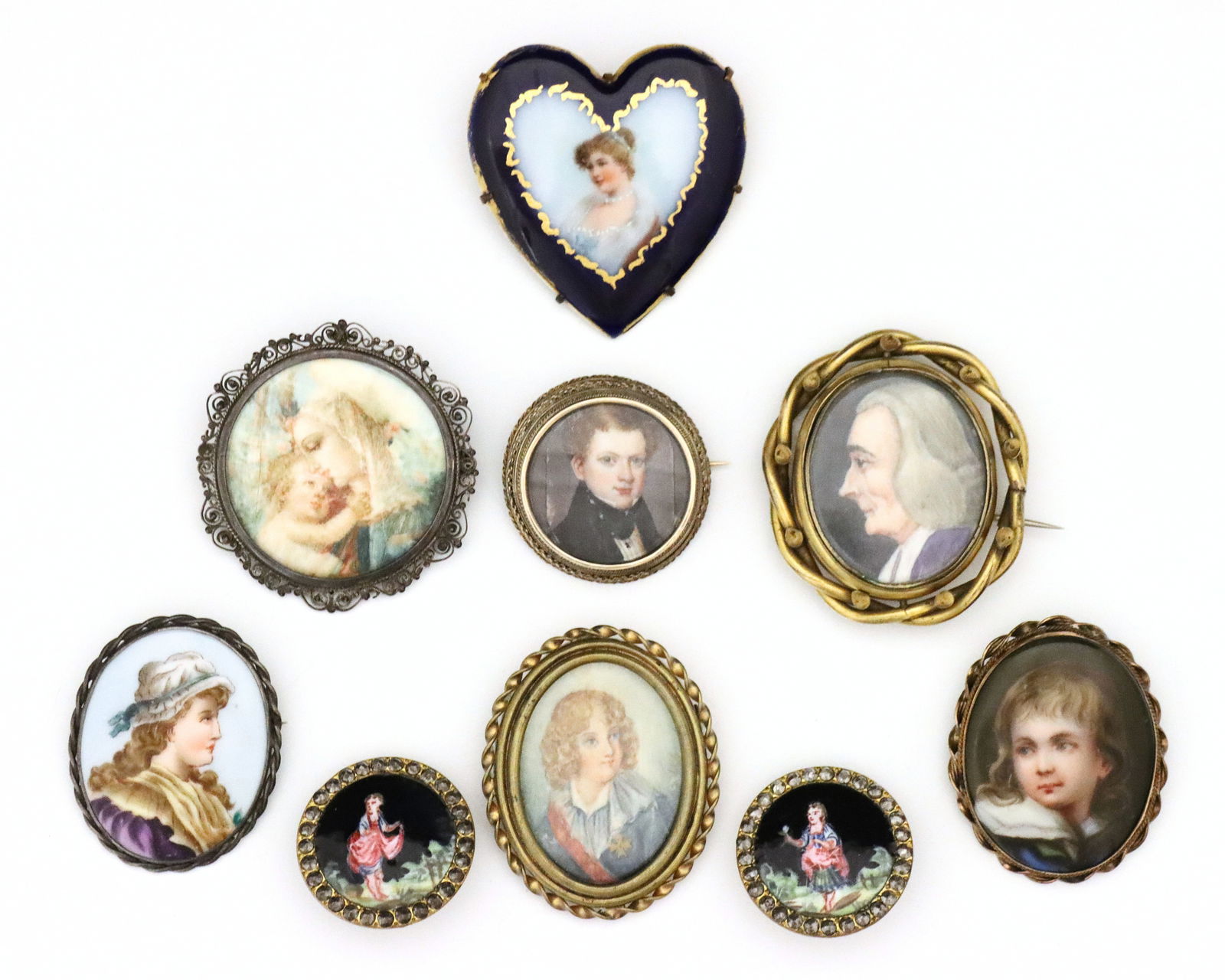 8 Accessories with Miniature Portraits: Eight 19th and 20th century accessories with miniature portraits. Painted and porcelain portraits, includes seven brooches and a pair of enameled clip-on earrings. Silver brooch with mother and child