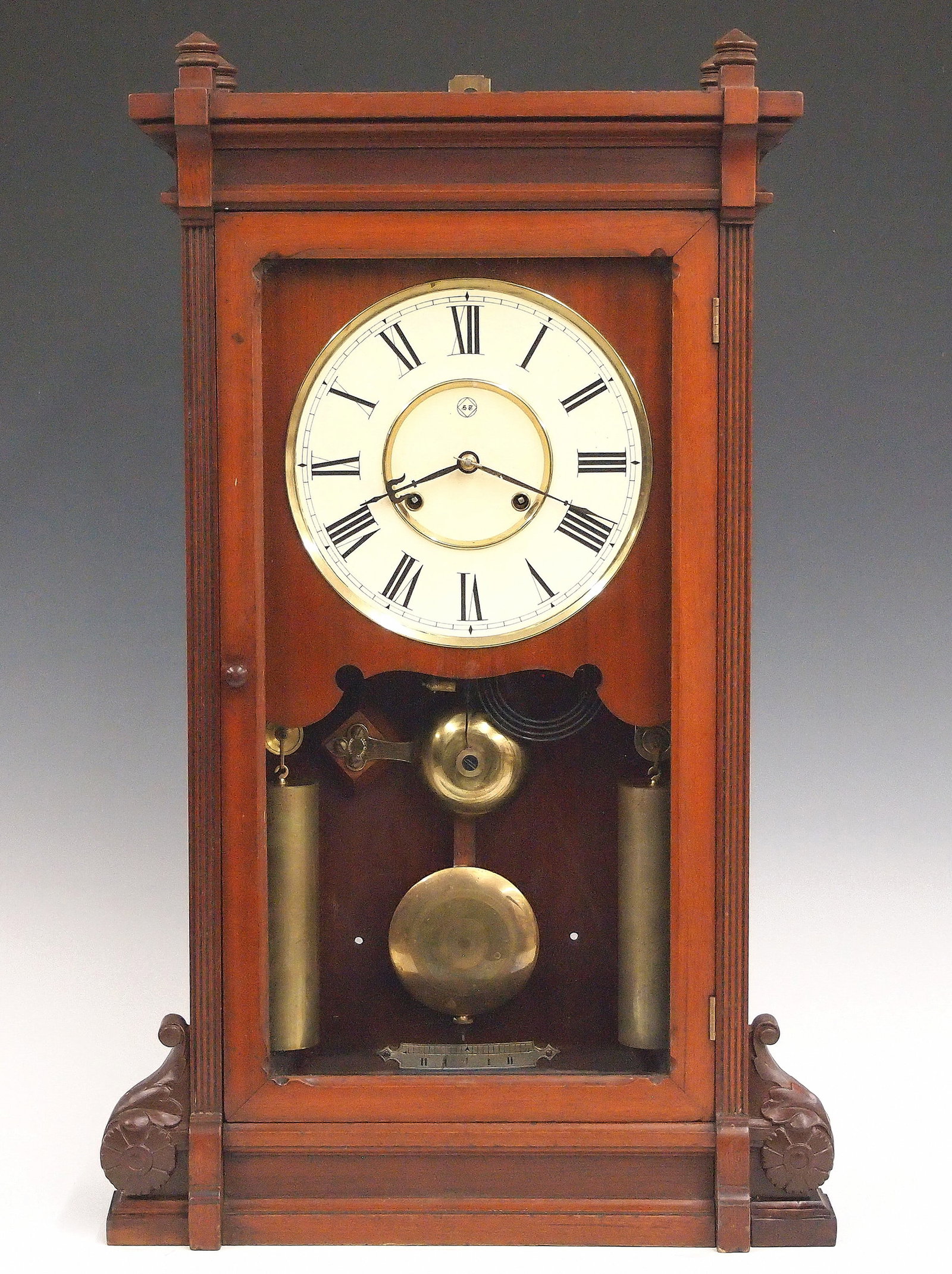 Seth Thomas Lincoln Model Shelf Clock: A late 19th century Seth Thomas Lincoln model shelf clock. 8-day weight driven time and strike movement with painted metal dial and Roman numerals, original damascened pendulum. Walnut case with