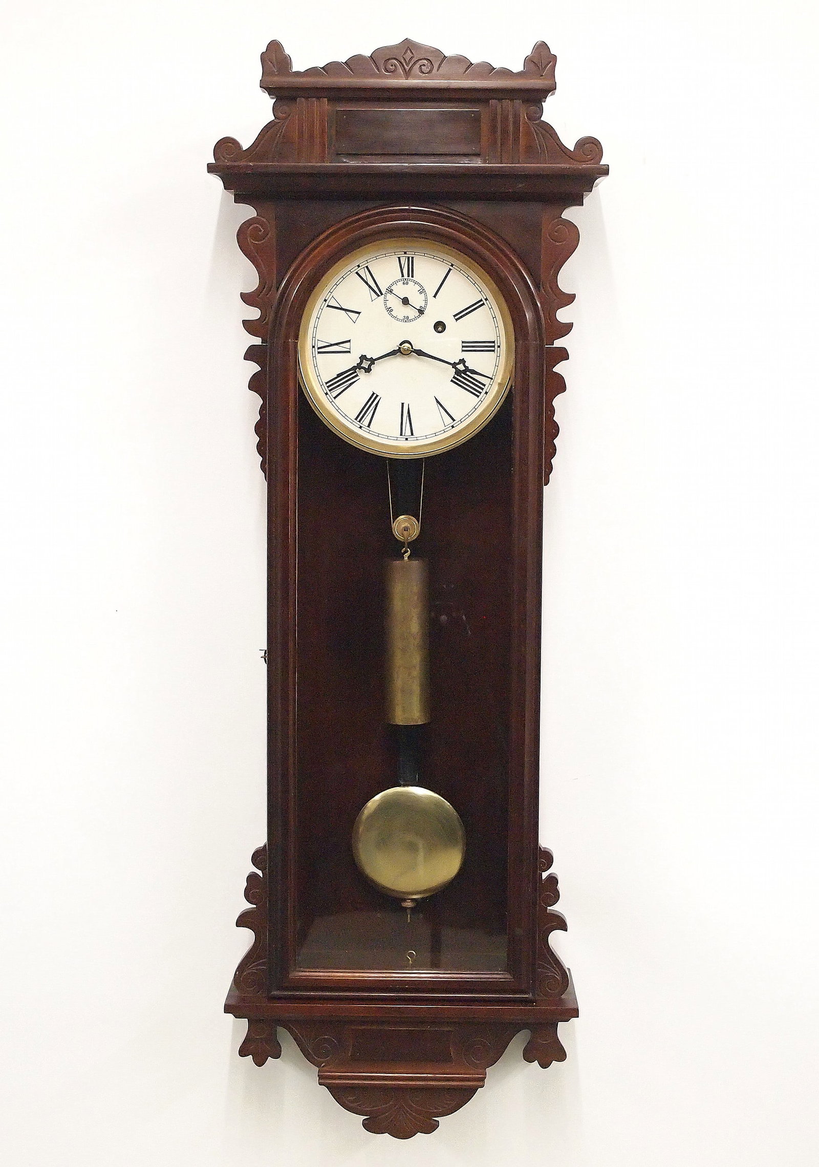 Repro Welch No. 11 Wall Clock: A late 20th century Repro Welch No. 11 Regulator wall clock, smaller than the original, made by Dick Broline. 8-day weight driven time only movement with maintaining power, papered metal dial and