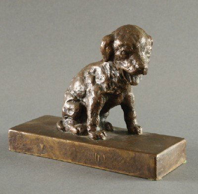 E Parsons Bronze dog: Edith Barretto Stevens Parsons, New York, 1879-1956. Bronze figure of a seated puppy. Impressed signature "E. B. Parsons" with "Gorham Co Founders, OFGA". Slight wear. 7 1/4" long. ESTIMATE $400-600