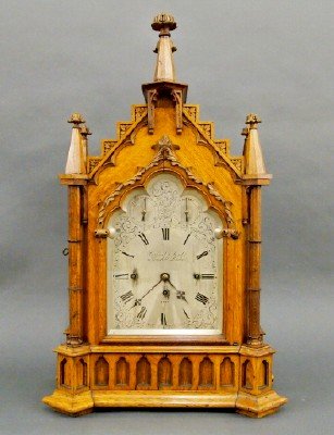Gothic Bracket clock: A 19th century English Oak Bracket clock by "Barraud & Lunds, 41 Cornhill, London". Very good quality 8-day Fusee movement with quarter hour musical striking on 8 bells and a coiled gong, marked "Barr