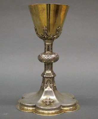 Sterling Communion Chalice: A 20th century Sterling Silver Communion Chalice by M & B, New York. Molded scalloped base with cast stem and Gold washed bowl. Engraved "Gift to Rev Francis P. Fenton…June 11, 1935". Slight surface