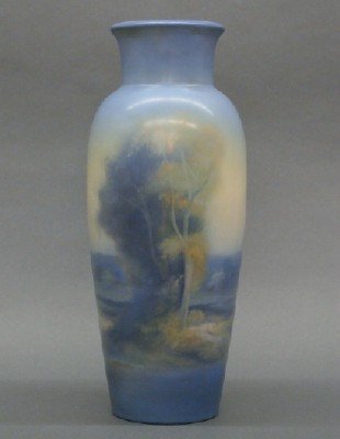 Rookwood vase: An early 20th century Rookwood Art pottery vase. Vellum glaze with hand painted scenic decoration by Fred Rothenbush, 1929. Impressed marks with date mark, "2785" mold mark and "FR" artist's cipher. S