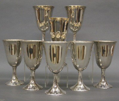 8 Sterling goblets: Eight 20th century Sterling Silver goblets by the M. Fred Hirsch Co. No damage. Each 6 1/4" high. 23.70 troy ozs. total weight. ESTIMATE $400-600