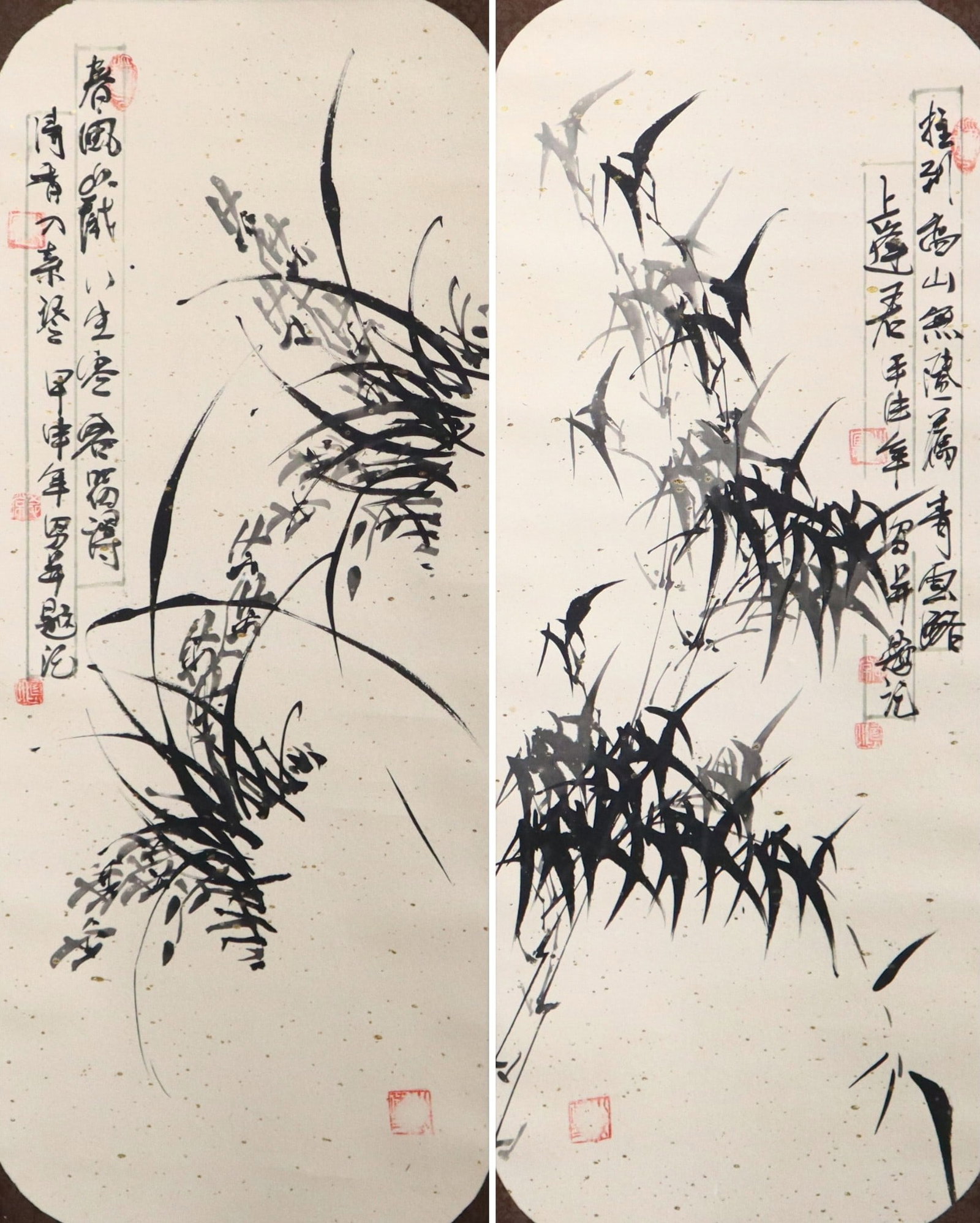 2 Chinese Ink Brush Hanging Scrolls: A Chinese two panel ink on gold flecked paper hanging scroll. Depicts stylized orchids and bamboo leaves. Calligraphy with four seals upper left and upper right, additional seals in lower portion and