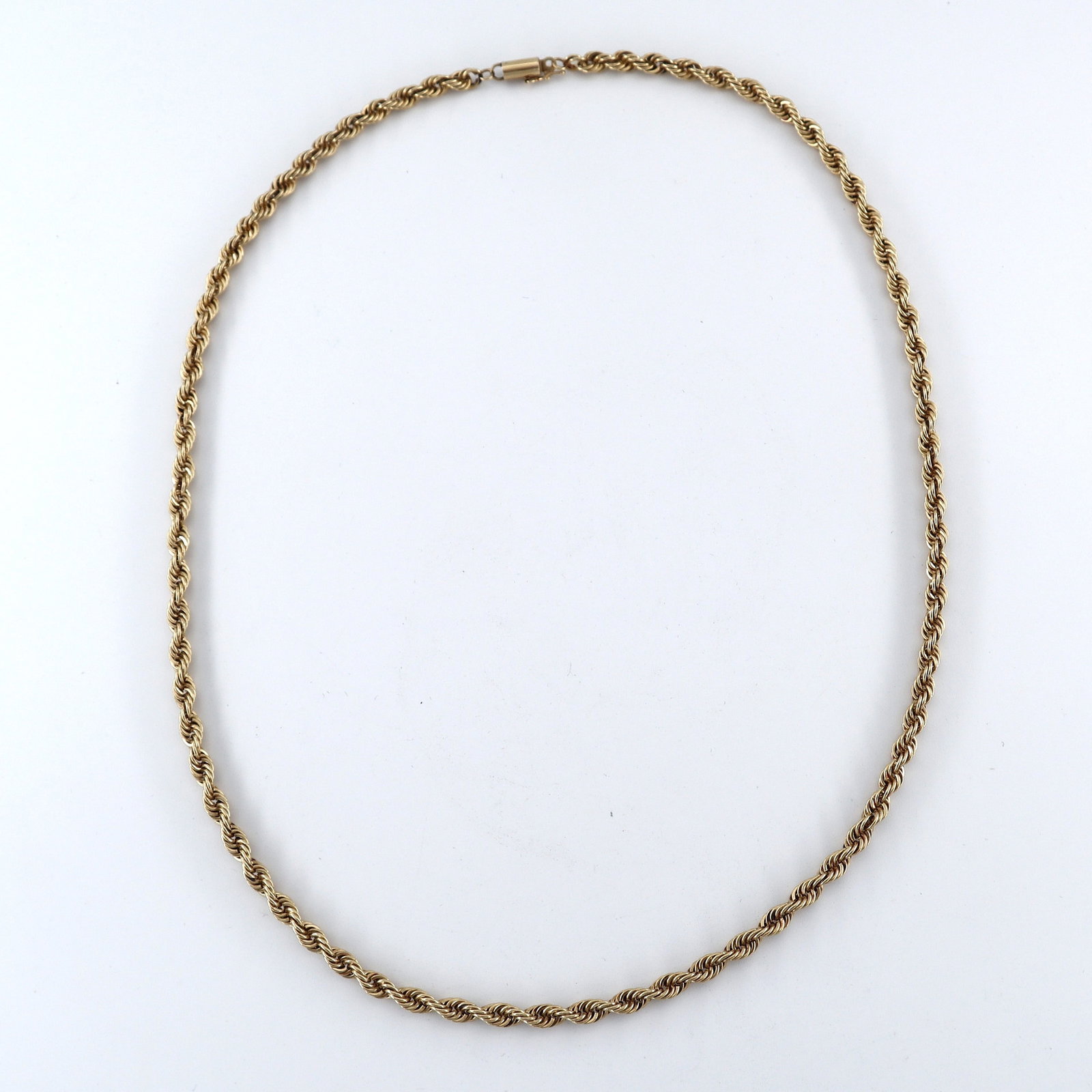 14k Gold Chain Necklace: A 14k Gold rope chain necklace. Marked "14k" at clasp. 49.6 grams total. Slight wear. 23" long open. ESTIMATE $2,000-4,000