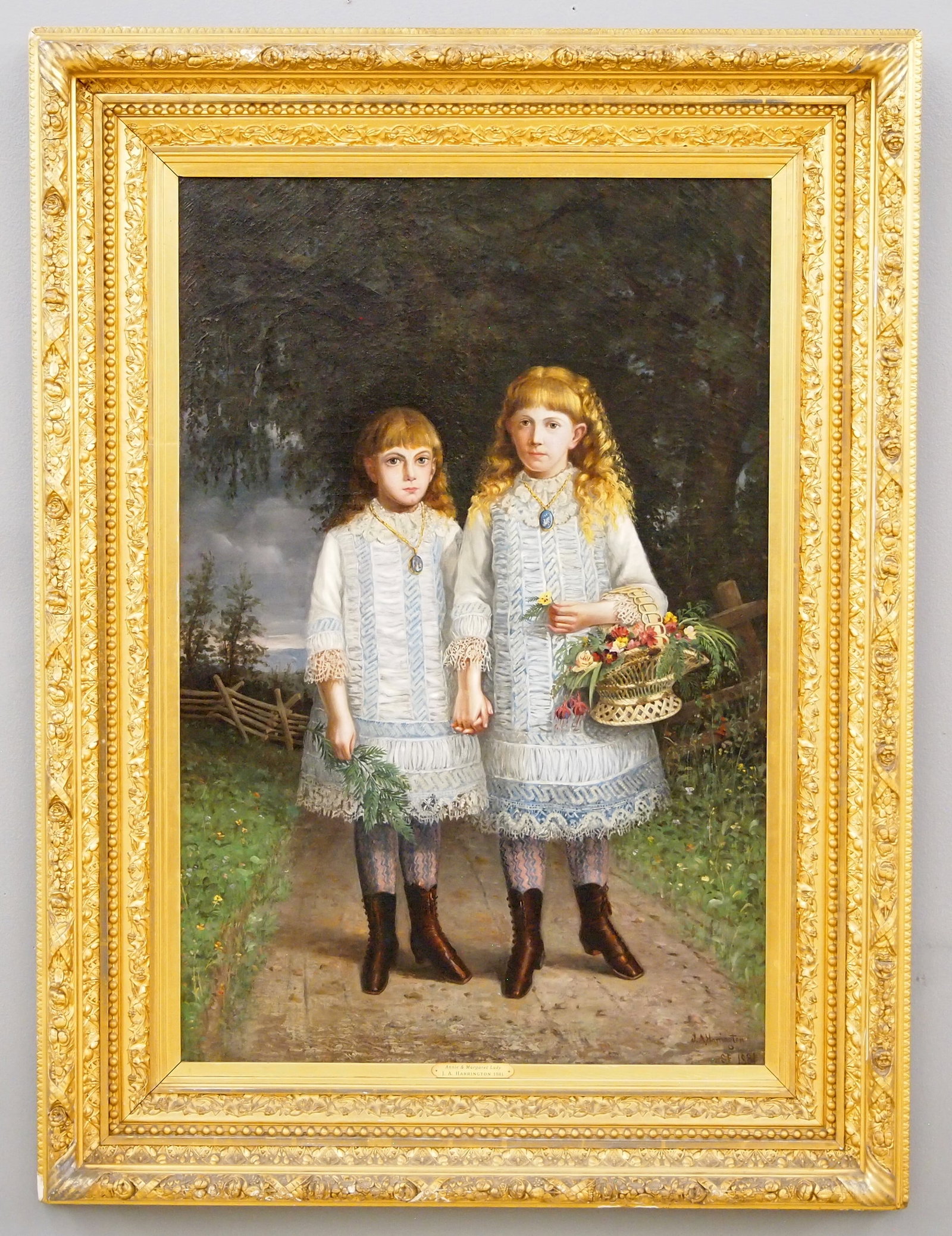 J.A. Harrington Portrait of Sisters: Joseph A. Harrington, Irish/American, 1844-1890. A late 19th century oil on canvas portrait depicting two sisters with golden curls, dressed alike in White and Blue dresses, the younger holding a fern