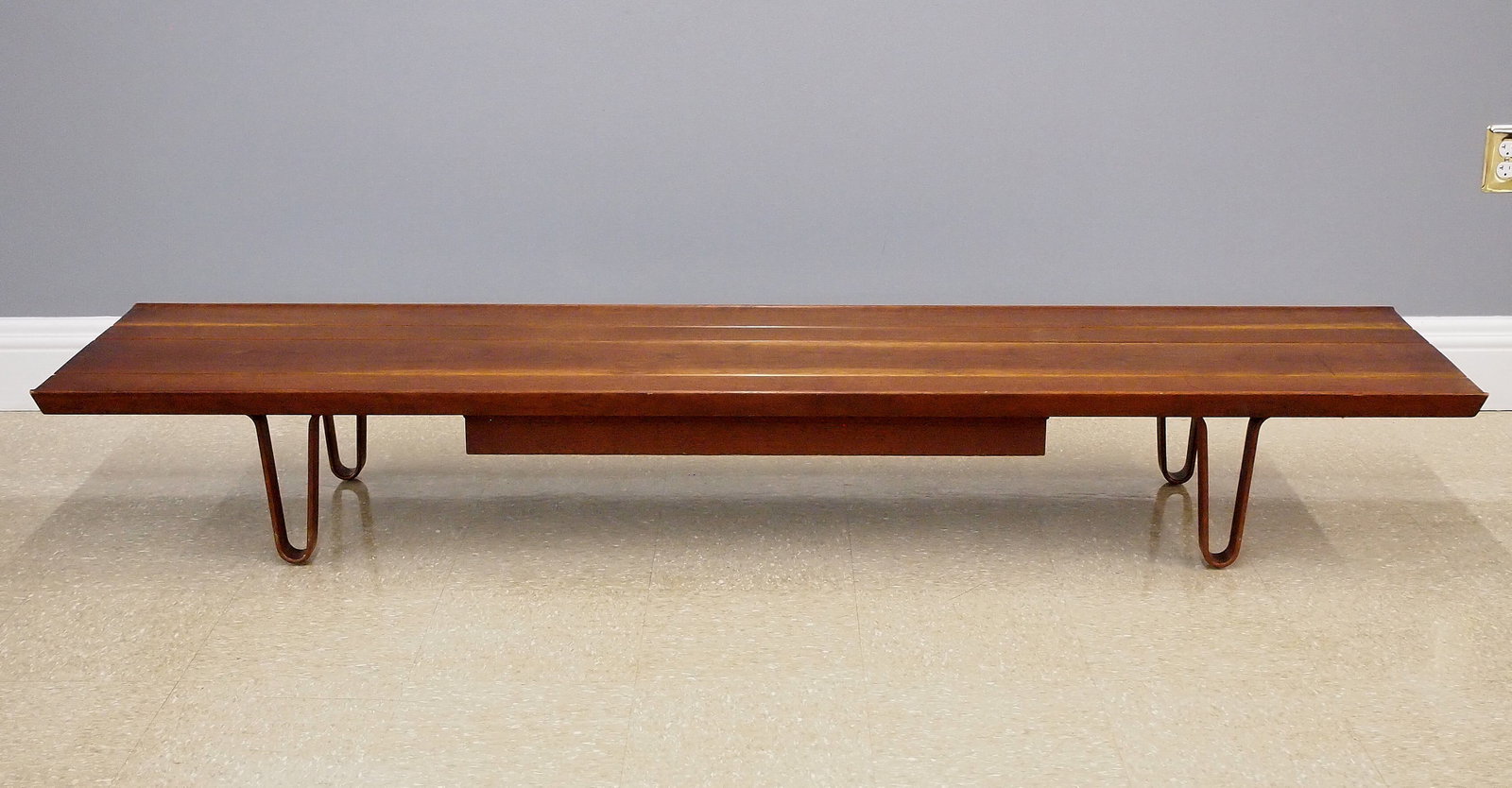 Edward Womley For Dunbar Bench: A Mid Century Modern bench by Edward Wormley for Dunbar, c. 1946. Model 4699 in Walnut with molded top and hanging drawer on bentwood legs. Retains original label and brass "Dunbar" plate. Original