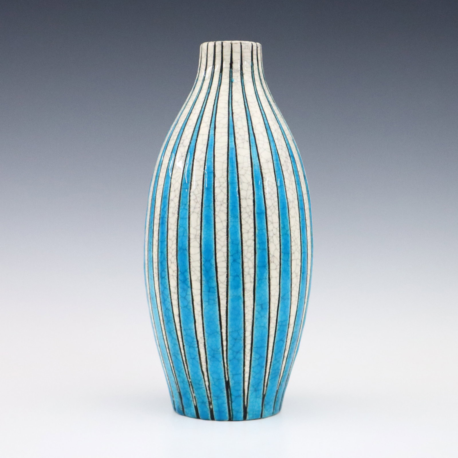 M. Dufrene for Boch Freres Art Pottery Vase: An early 20th century Art Deco Period Boch Freres Keramis Art Pottery vase by Maurice Dufrene. Baluster form with incised linear decoration and multi-color crackle glaze. Painted "M. Dufrene" signatur