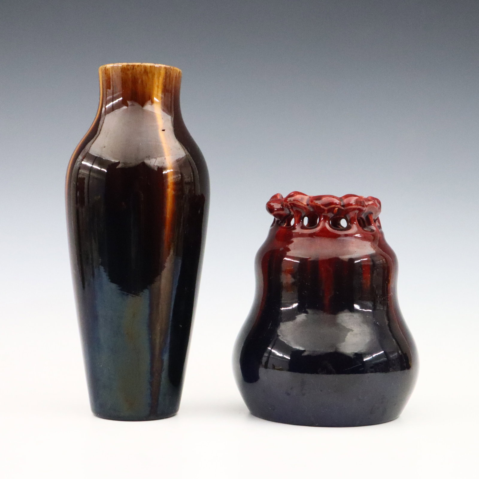 2 M. Andersen & Son Art Pottery Vases: Two early to mid 20th century Michael Andersen & Son Art Pottery vases. Molded bodies with multi-color drip glaze, one with reticulated rim. Impressed "MA & S" and "Denmark" marks. Some surface wear a