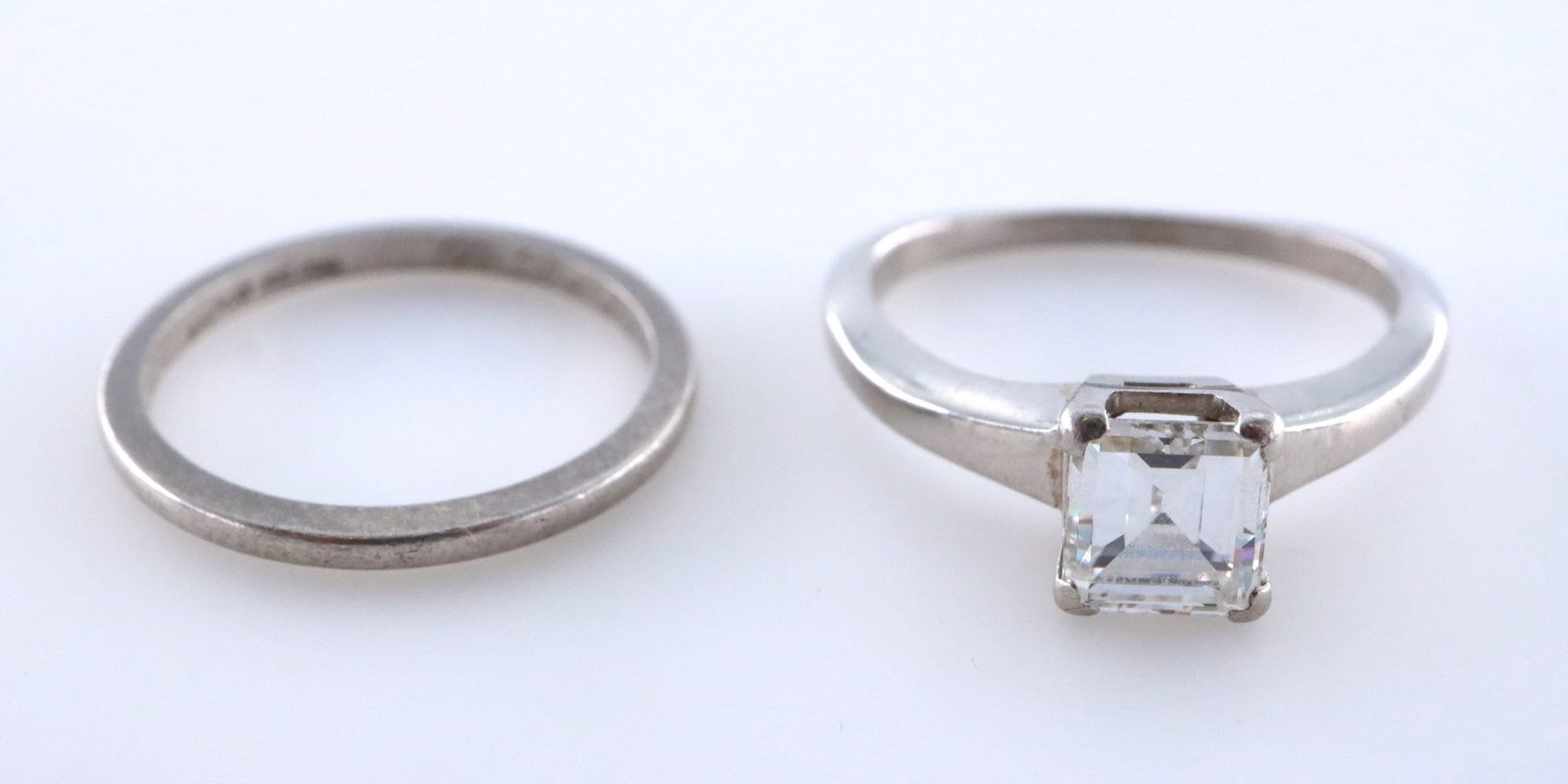 Platinum & Diamond Wedding Set: A 1930's Platinum and Diamond wedding ring set. Includes a solitaire engagement ring featuring a rectangular Asscher type cut prong set Diamond, approx. 5.65 mm x 6.25 mm (3.7 depth), estimated 1.10 t