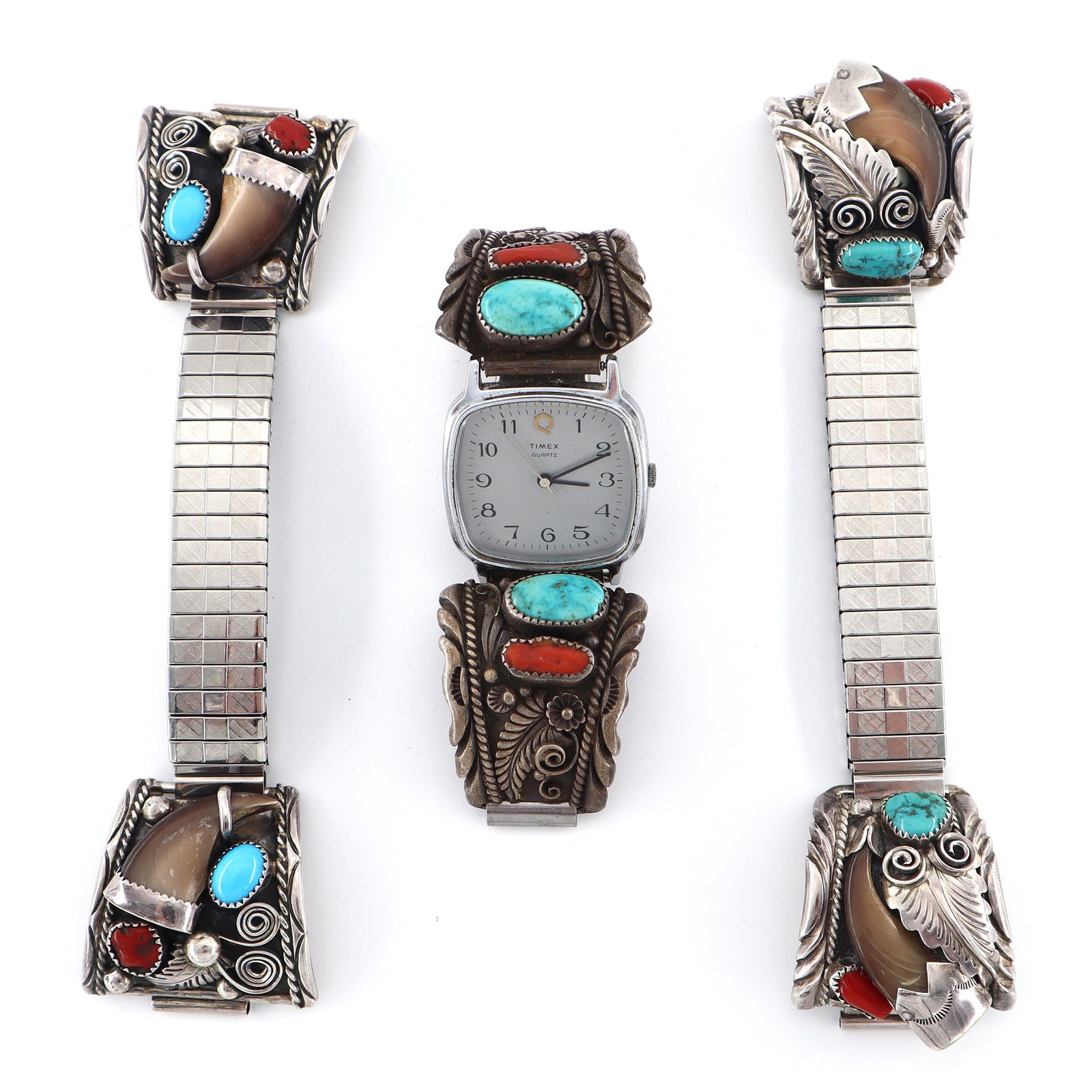 3 Navajo Sterling Watch Bracelets: Three vintage Navajo Sterling Silver watch bracelets. Feature Sterling watch bracelets, two with mounted Bear claws, with sawtooth bezel set Turquoise and Coral cabochons, and cast foliate accents. On