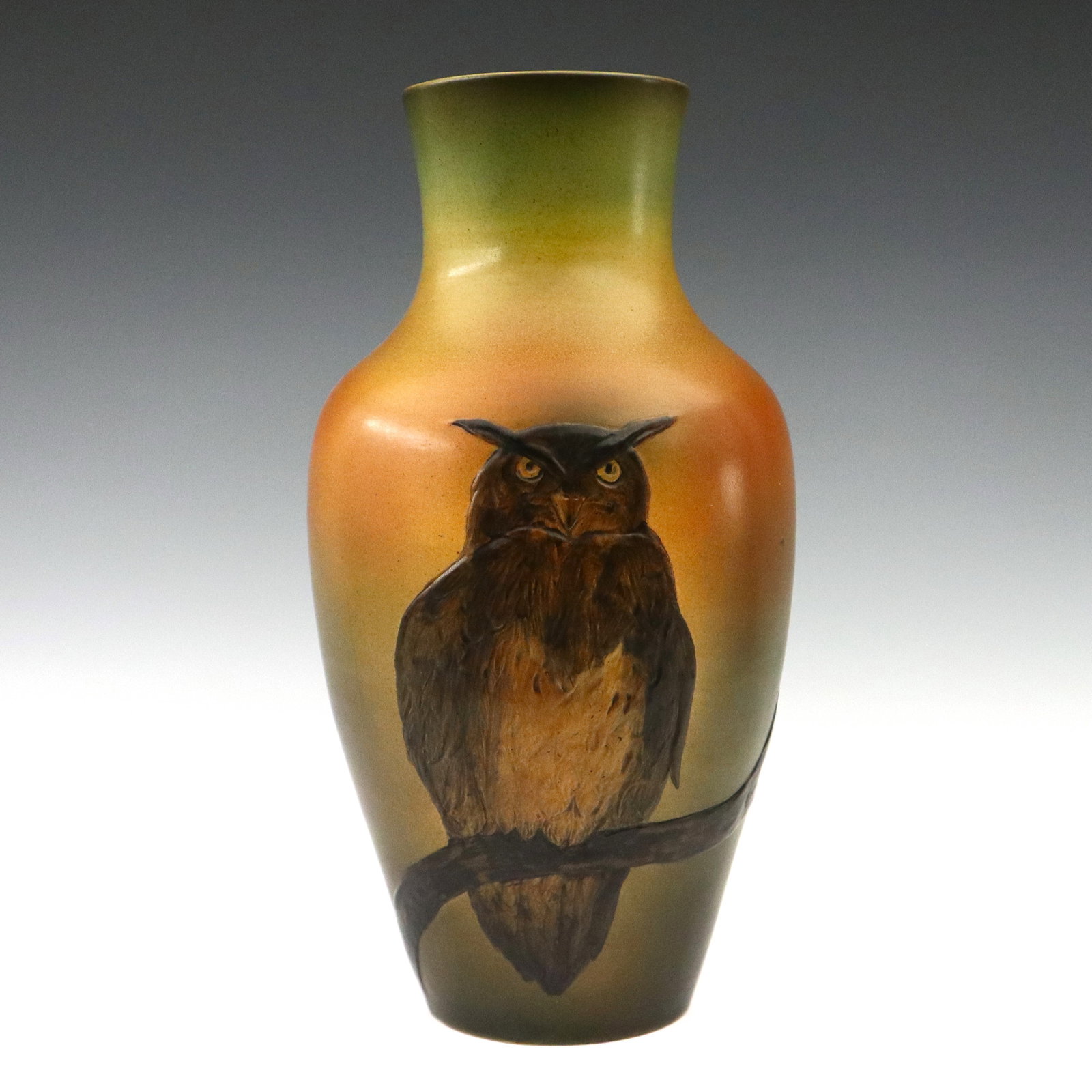 P. Ipsens Enke Art Pottery Vase: An early 20th century P. Ipsens Enke Art Pottery vase. Molded baluster form body with an Owl and Bat design, and multi-color decoration. Impressed "PIE" with Crown mark and numerals. Minor wear, small