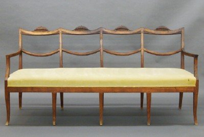 Classical settee: An early 19th century Classical Period Mahogany settee. Quad chair back design with carved crests, shaped arms, an upholstered seat and fine shaped legs. Older refinishing with some wear. 72" long. ES