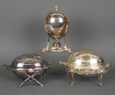 3 pc Silver plate: Three pieces of turn of the century English Silver plate. Two small warming dishes with pivoting covers and a covered egg coddler. Some wear, one lacks hinge retaining pins. ESTIMATE $100-150