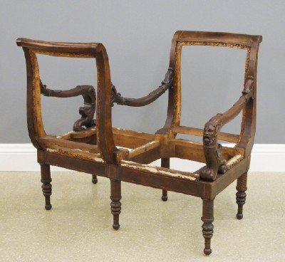 Tete a tete: A mid 19th century American Tete-a-Tete, possibly from the workshops of Isaac Vose, Boston. Walnut and burl walnut frame with string inlay, carved leaves at the armrests, and carved masks just below t