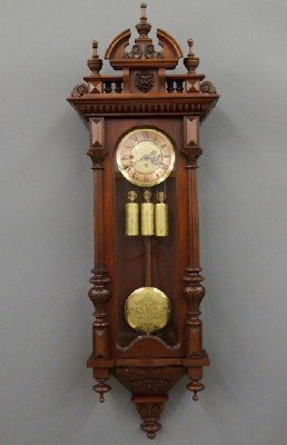 Gustav Becker wall clock: A 19th century 3 weight Vienna Regulator wall clock by Gustav Becker. 8-day time and strike movement (Serial #230,533 ca. 1875) with quarter hour "Grand Sonnerie" strike, engraved Brass dial with matc
