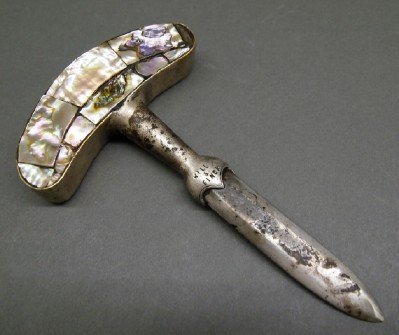 Will & Finck dagger knife: A late 19th century dagger knife by Will & Finck, San Francisco, California. Curved handle with inset Abalone shell, marked on shaft "Will & Finck, San Fran". Some wear, older soldered repair. 6 1/4"