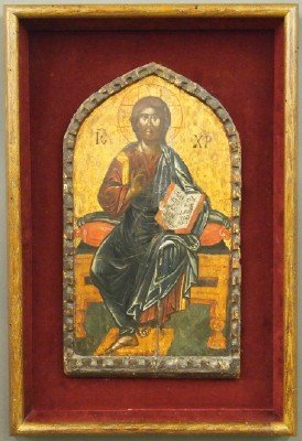 16th C. Greek Icon: A 16th Century Greek Icon of "Christ the Teacher". Tempera on wood panel depicts Christ seated, with a halo surrounding his head; His right hand is uplifted, extending a blessing, and He holds an open