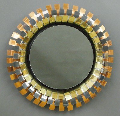 Curtis Jere "Eyelash" Mirror: Curtis Jere, Artisan House, 20th Century. Circular "Eyelash" mirror is enhanced by curved strips of brass, copper, and steel. Signed. Some wear evident. 20 1/2" diameter. ESTIMATE $600-800