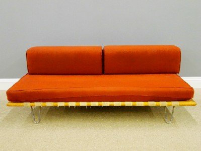 George Nelson 5088 Daybed: A Mid Century Modern Daybed Designed by George Nelson for Herman Miller. Birch wood back and frame with interwoven canvas straps that support a single seat cushion and Two back cushions all raised on