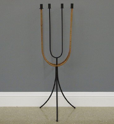 A. Umanoff Candelabrum: An American Mid-Century Modern Floor Candelabrum Designed by Arthur Umanoff for Raymor. Wrought iron and woven rattan "U" form floor candelabrum; with four lights and a tripod base. No apparent markin