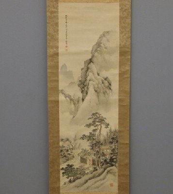Chinese Painted Silk Scroll: A Chinese Painted Silk Scroll. Hand painted silk depicts a Lone figure within a quaint house, which is cradled within a lush Mountainous landscape. Signed with Two red seals at the upper left, and one