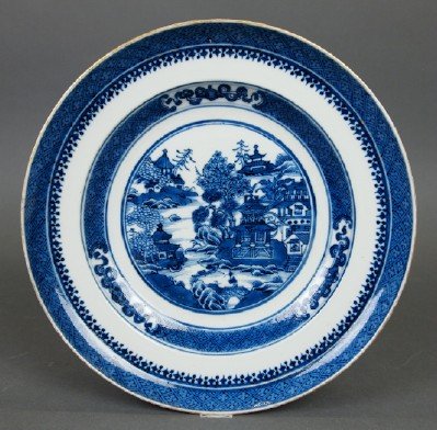Chinese Canton Porcelain dish: A Chinese Canton Porcelain Deep Dish. Blue and White porcelain bowl in the traditional "Canton" motif. Unmarked, very minor wear. 9 3/4" diameter. ESTIMATE $100-150