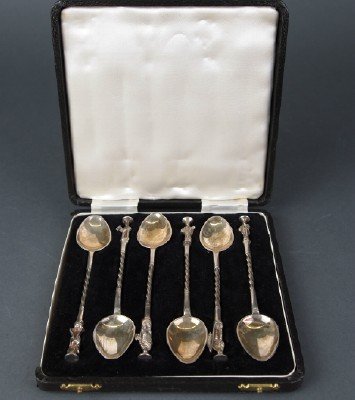 Kenneth Tyler Key Sterling Spoons: A Set of Six Sterling Spoons by Kenneth Tyler Key. Each with a figure of an Apostle or Saint at the tip. Stamped on the back with anchor, lion passant, date mark "Y" (1948) and maker's initials "KTK".