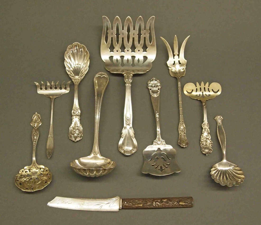 10 pcs of Sterling Flatware: Ten Pieces of American Sterling Flatware. Group of various serving pieces in numerous patterns, by multiple makers including Gorham, Reed & Barton, Towle, and George W. Shiebler & Co.. Included is a G