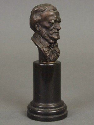 Bronze Bust of Richard Wagner: An Early 20th Century Bronze Bust of Richard Wagner. On a small columnar form base with a "Made in Italy" paper label at the base. Unmarked. Minor wear. 6 1/2" high. ESTIMATE $100-200
