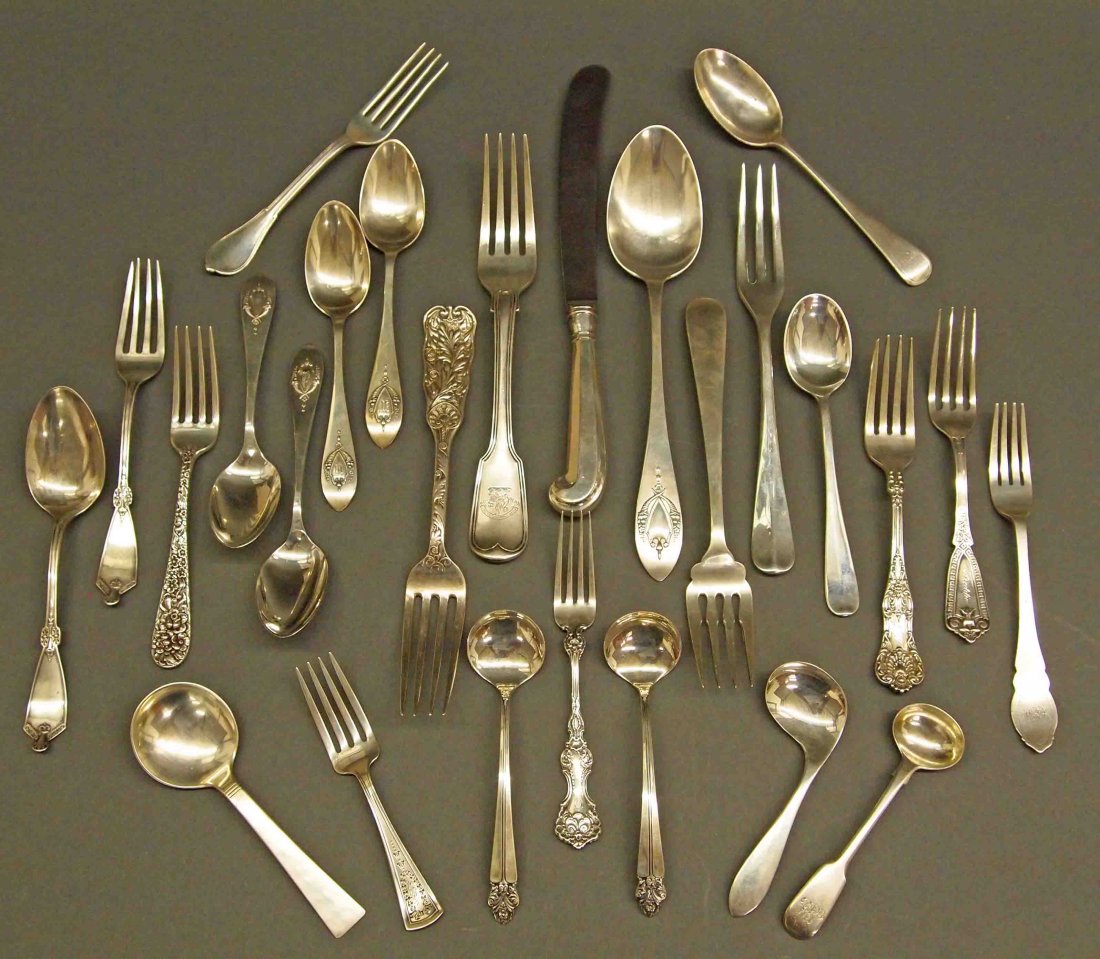 American & English Sterling Flatware: Twenty-Six Pieces of American and English Sterling Flatware. Consisting of Twenty-Two pieces of various types of American flatware, in numerous patterns and by multiple makers including Allan Alder, L
